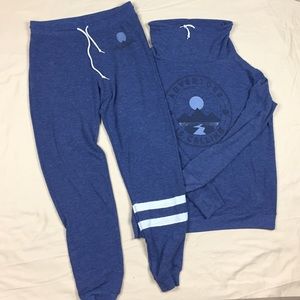 Womans well worn sweat suit